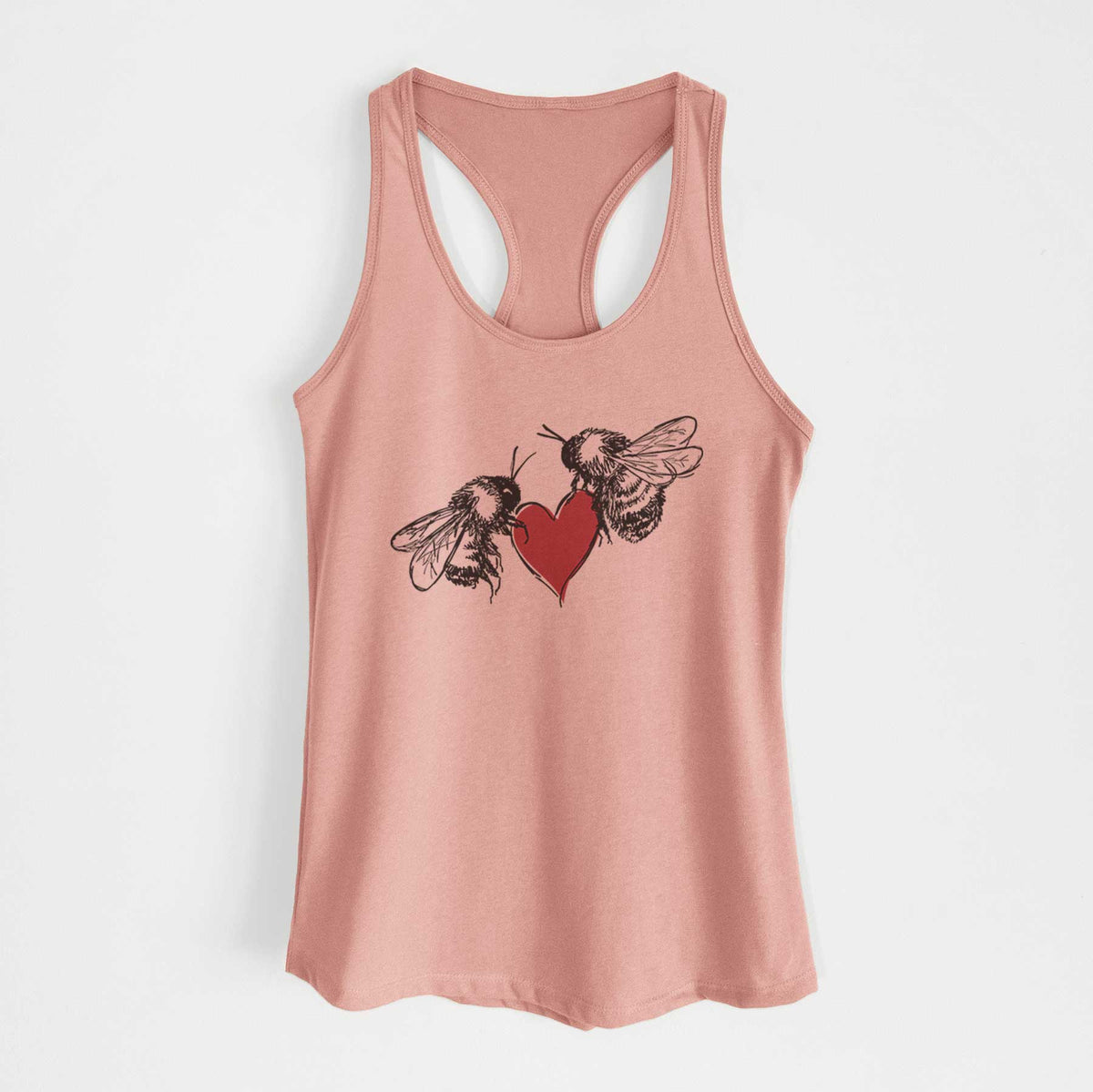 Desert pink women's racerback tank top laid flat, printed with a black ink illustration of two bees facing each other with a red heart between them.