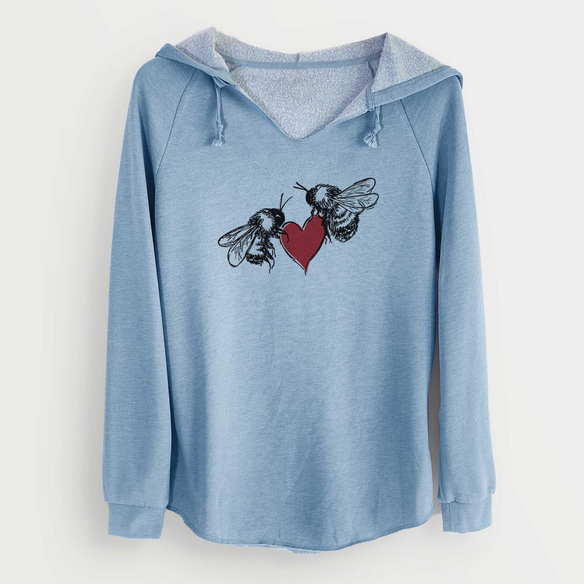 Misty blue women's Cali Wave hooded sweatshirt laid flat, printed with a black ink illustration of two bees facing each other with a red heart between them.