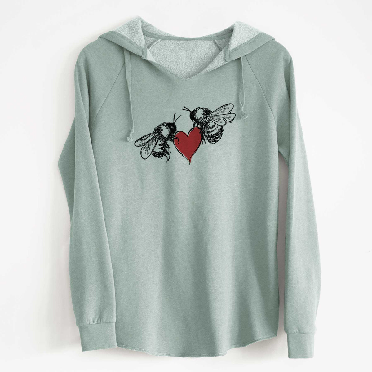 Sage green women's Cali Wave hooded sweatshirt laid flat, printed with a black ink illustration of two bees facing each other with a red heart between them.