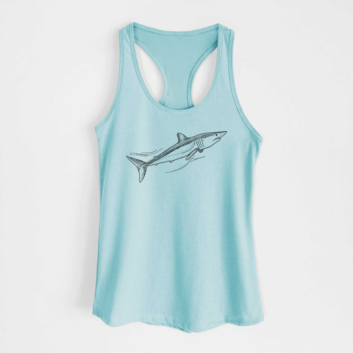 Cancun blue women's racerback tank top laid flat, printed with a black ink illustration of a mako shark swimming.