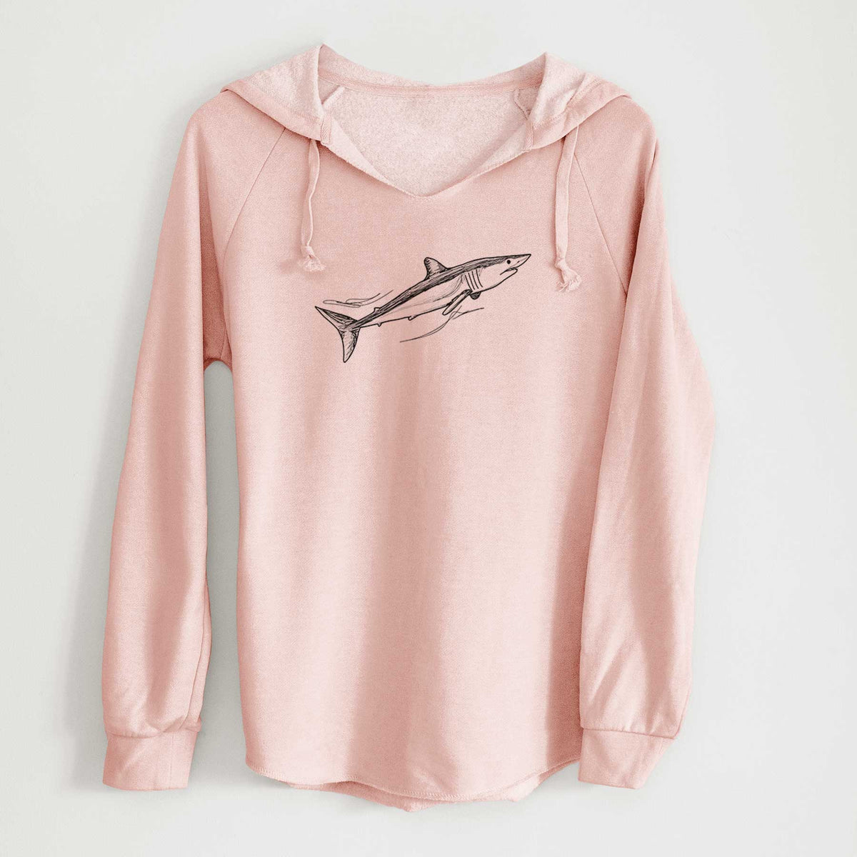 Blush pink women's Cali Wave hooded sweatshirt laid flat, printed with a black ink illustration of a mako shark swimming.