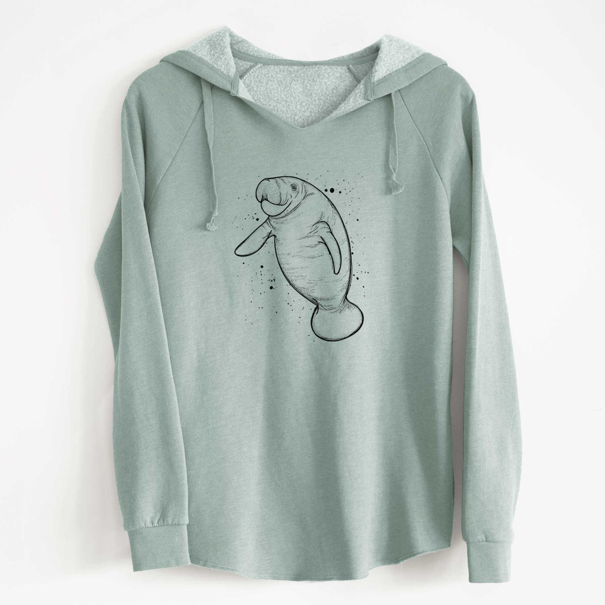 Sage green women's Cali Wave hooded sweatshirt laid flat, printed with a black ink line drawing of a manatee swimming, with ink splatters.