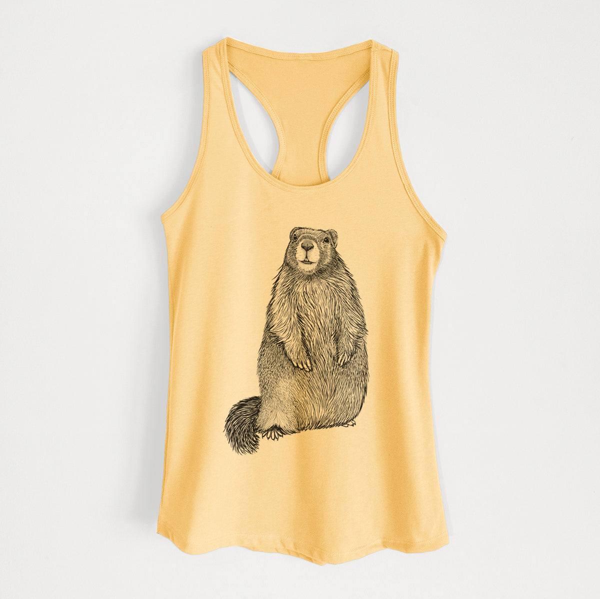 Banana cream women's racerback tank top laid flat, printed with a detailed black ink illustration of a marmot standing upright.
