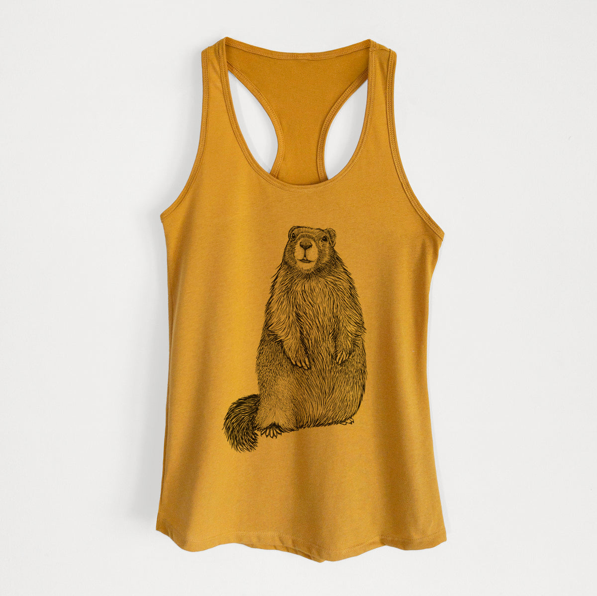 Gold women's racerback tank top laid flat, printed with a detailed black ink illustration of a marmot standing upright.