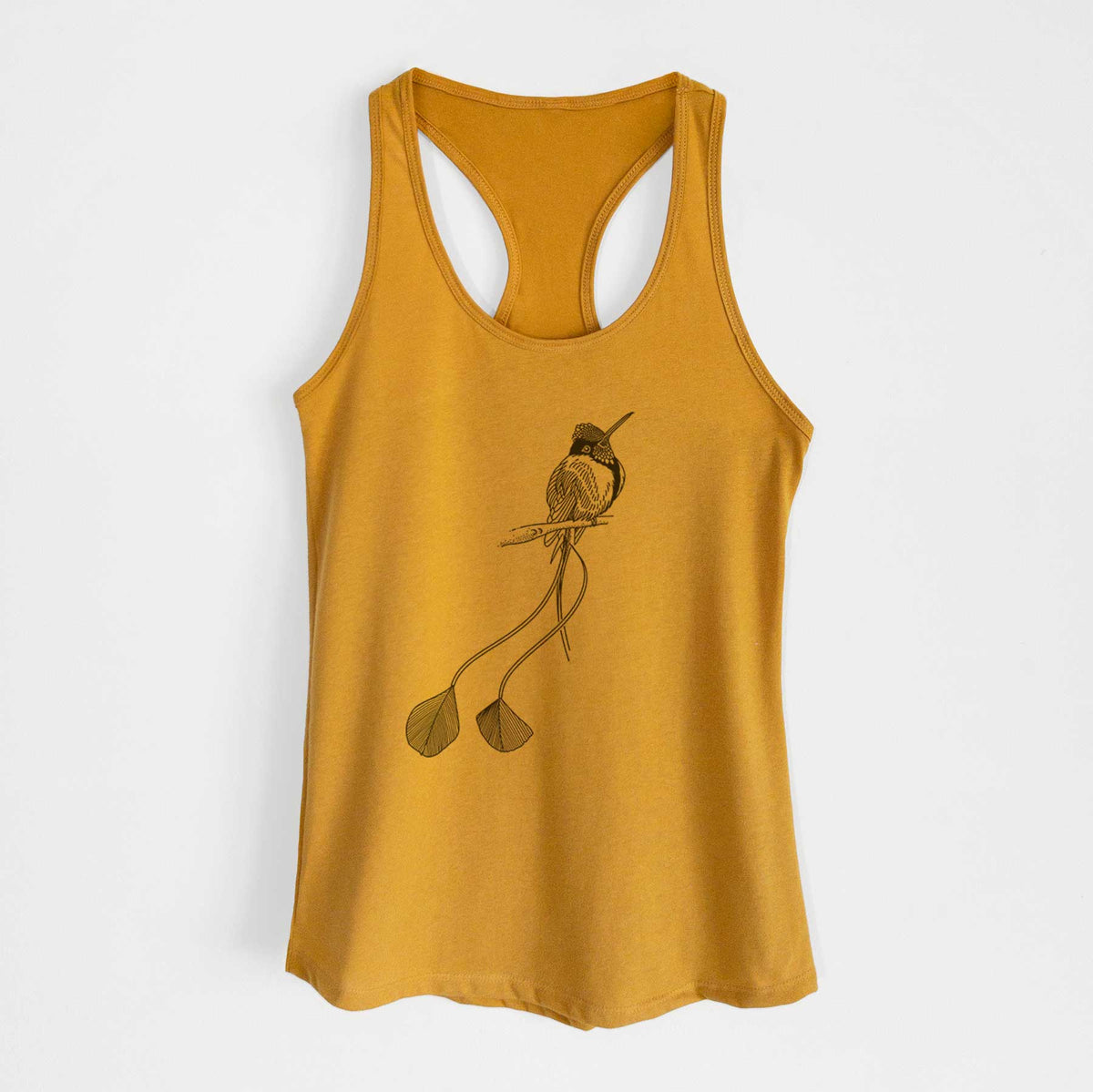 Gold women's racerback tank top laid flat, printed with a black ink illustration of a marvelous spatuletail hummingbird perched, with its two long racket-tipped tail feathers.