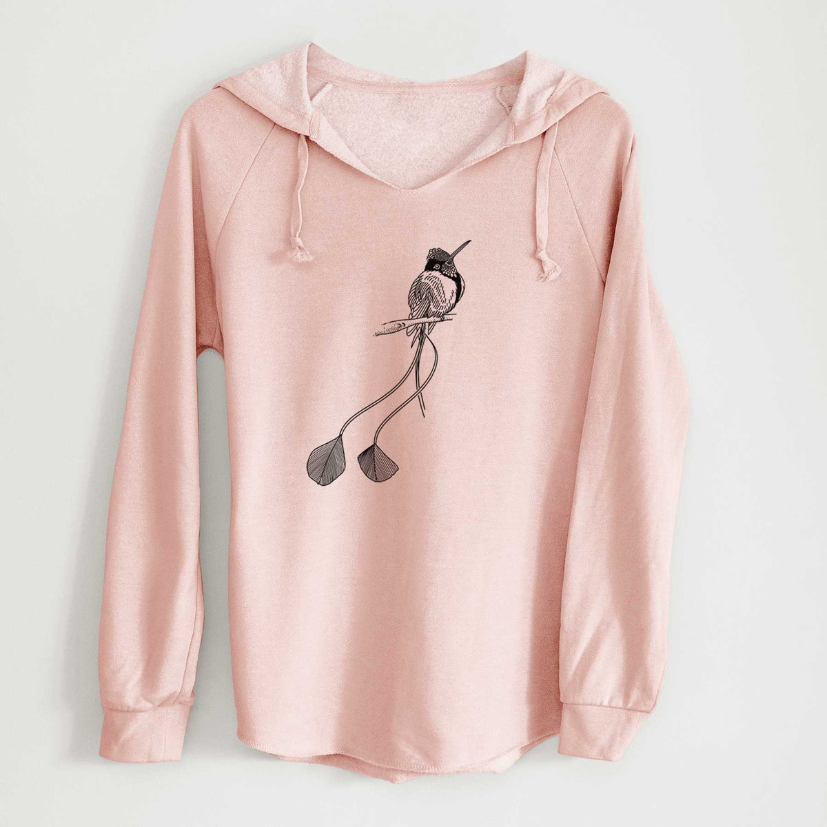 Blush pink women's Cali Wave hooded sweatshirt laid flat, printed with a black ink illustration of a marvelous spatuletail hummingbird perched, with its two long racket-tipped tail feathers.