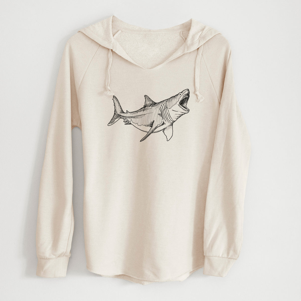 Bone cream women's Cali Wave hooded sweatshirt laid flat, printed with a black ink illustration of a megalodon shark with its jaws open.