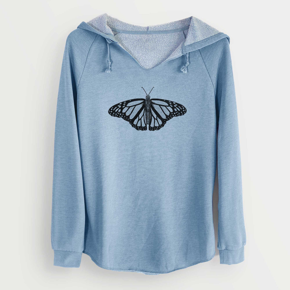 Misty blue women's Cali Wave hooded sweatshirt laid flat, printed with a detailed black ink illustration of a monarch butterfly with its wings spread.