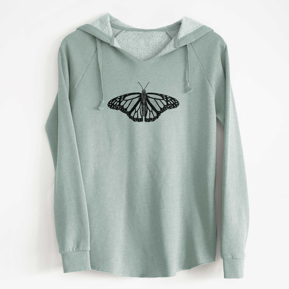 Sage green women's Cali Wave hooded sweatshirt laid flat, printed with a detailed black ink illustration of a monarch butterfly with its wings spread.