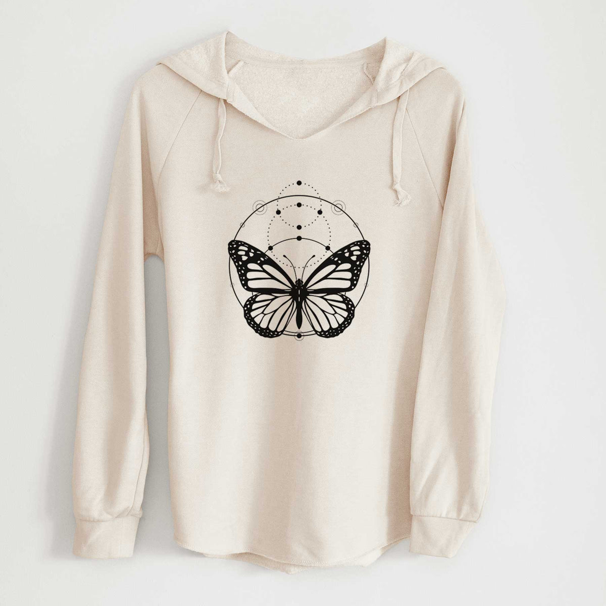 Bone cream women's Cali Wave hooded sweatshirt laid flat, printed with a black ink monarch butterfly inside a circle, beneath a line of moon phases.