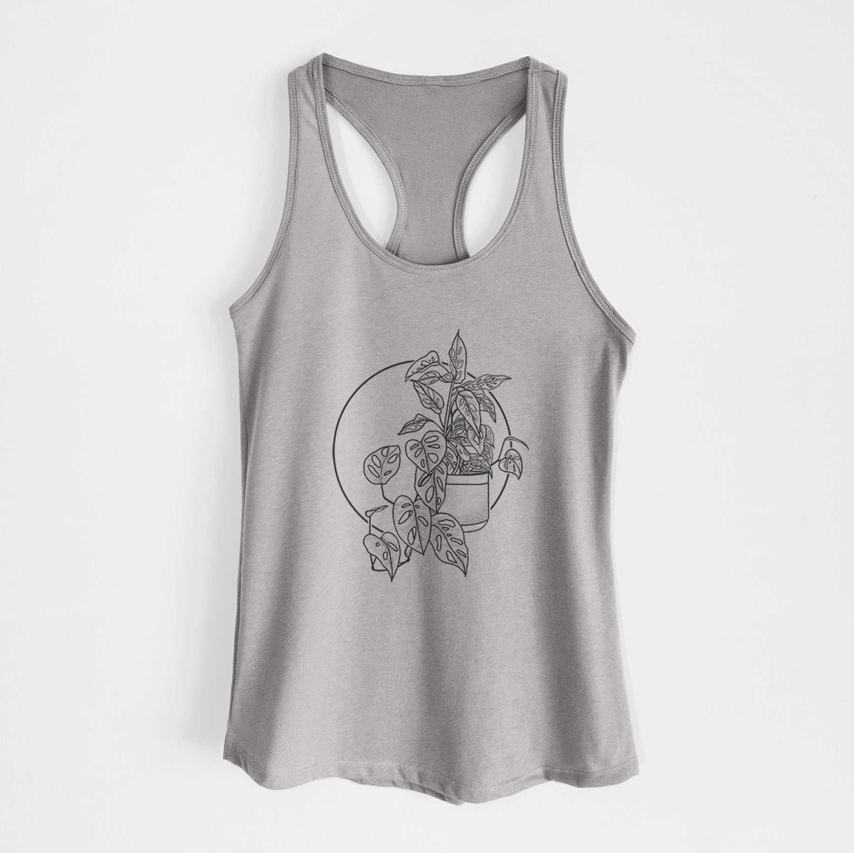 Heather grey women's racerback tank top laid flat, printed with a black ink illustration of a potted Monsteradansonii plant with trailing vines in front of a circle.