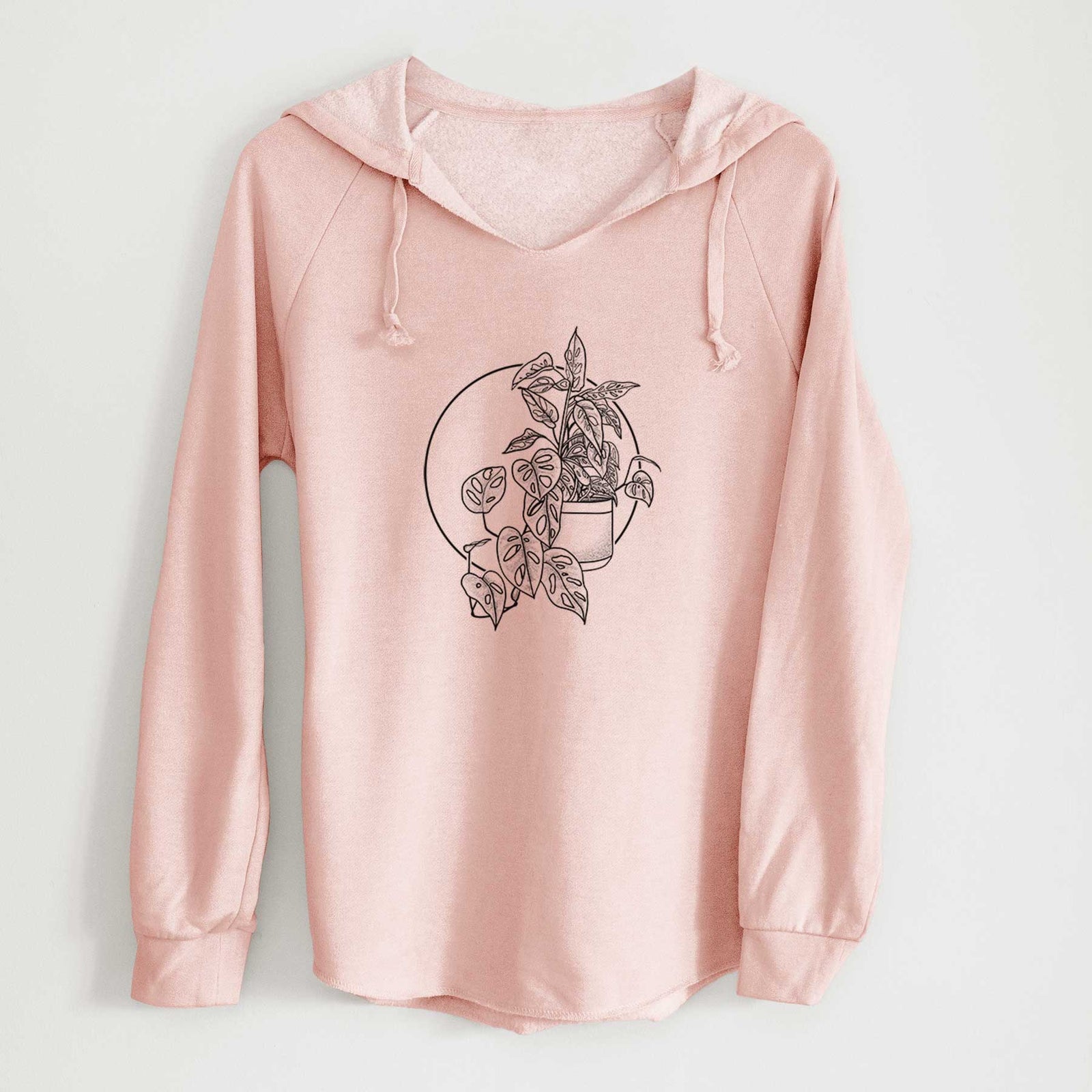 Sage green women's Cali Wave hooded sweatshirt laid flat, printed with a black ink illustration of a potted Monsteradansonii plant with trailing vines in front of a circle.