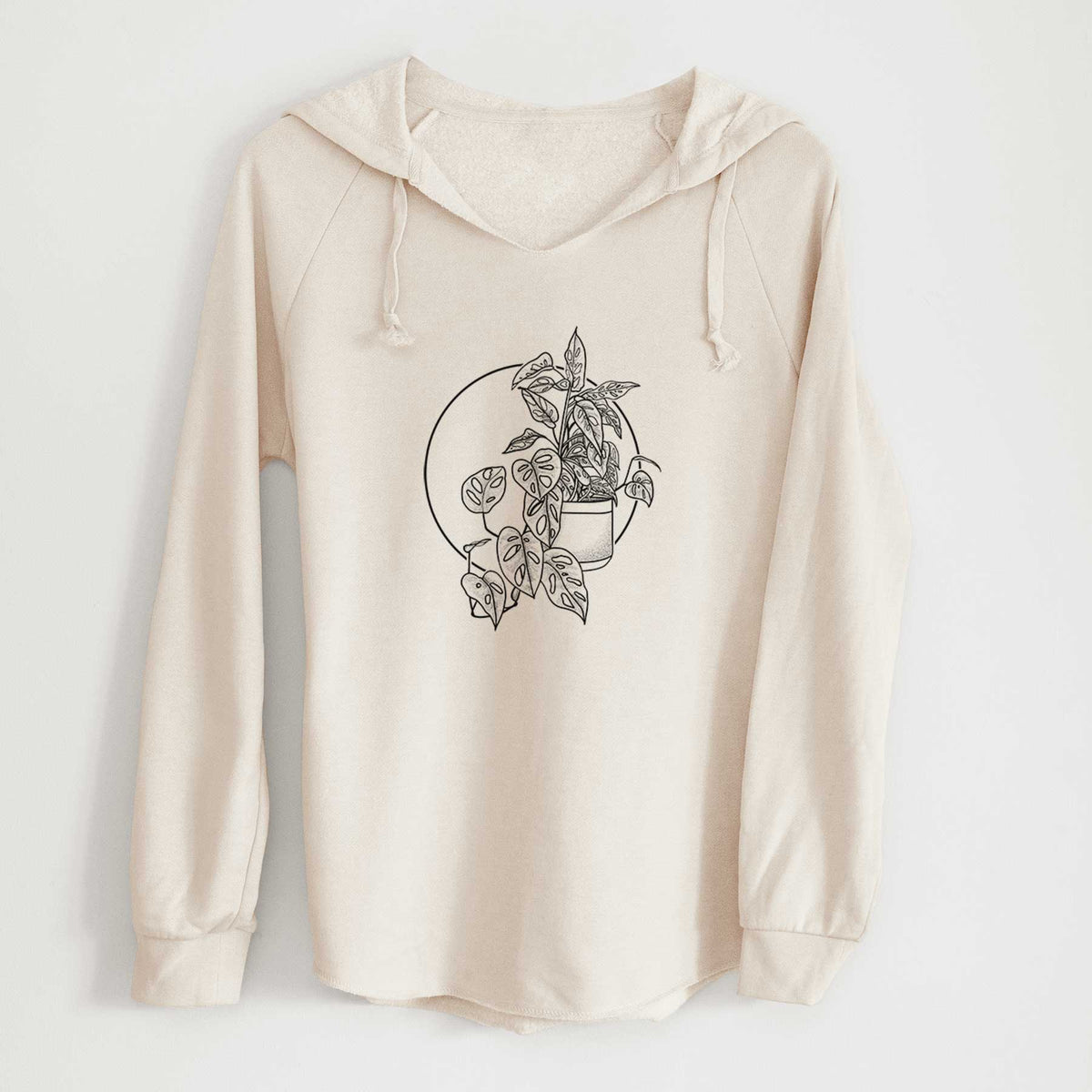 Bone cream women's Cali Wave hooded sweatshirt laid flat, printed with a black ink illustration of a potted Monsteradansonii plant with trailing vines in front of a circle.