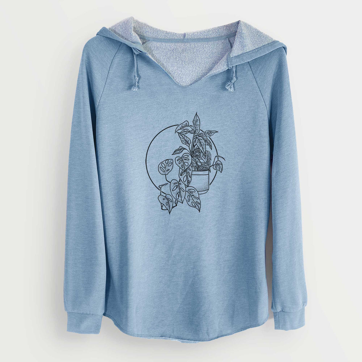 Misty blue women's Cali Wave hooded sweatshirt laid flat, printed with a black ink illustration of a potted Monsteradansonii plant with trailing vines in front of a circle.
