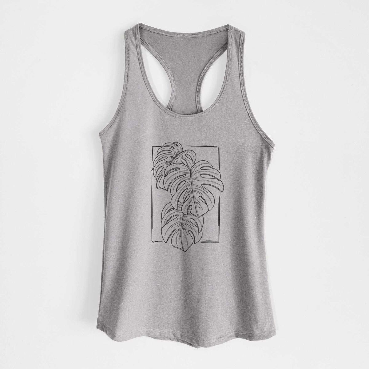 Heather grey women's racerback tank top laid flat, printed with a black ink line drawing of Monstera deliciosa leaves inside a rectangle outline.