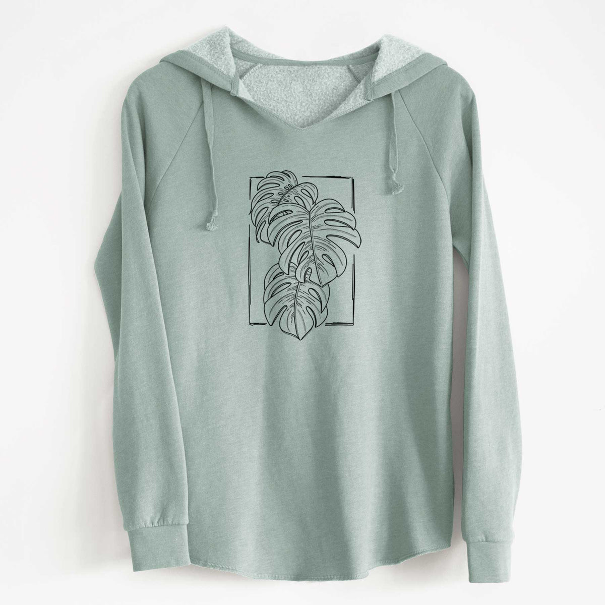 Sage green women's Cali Wave hooded sweatshirt laid flat, printed with a black ink line drawing of Monstera deliciosa leaves inside a rectangle outline.