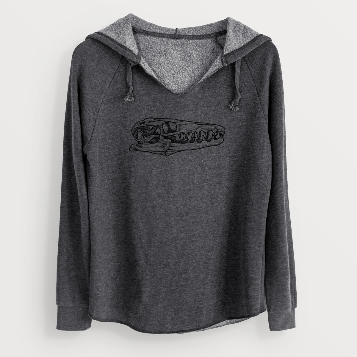 Charcoal grey women's Cali Wave hooded sweatshirt laid flat, printed with a detailed black ink illustration of a Mosasaur skull.