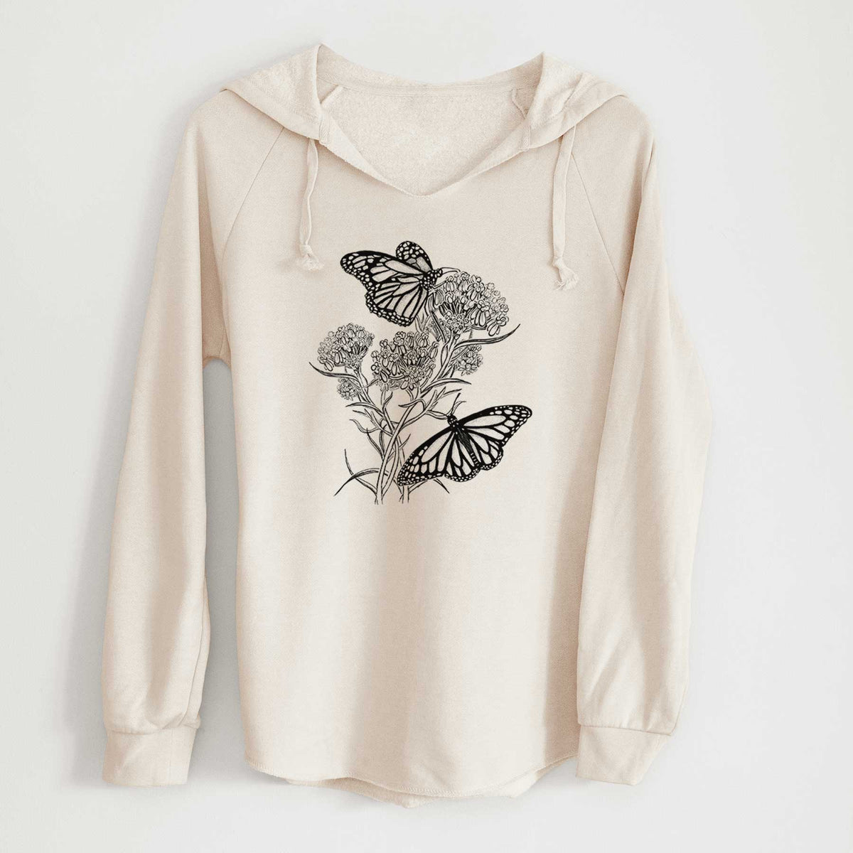 Bone cream women's Cali Wave hooded sweatshirt laid flat, printed with a black ink illustration of two monarch butterflies on flowering milkweed.
