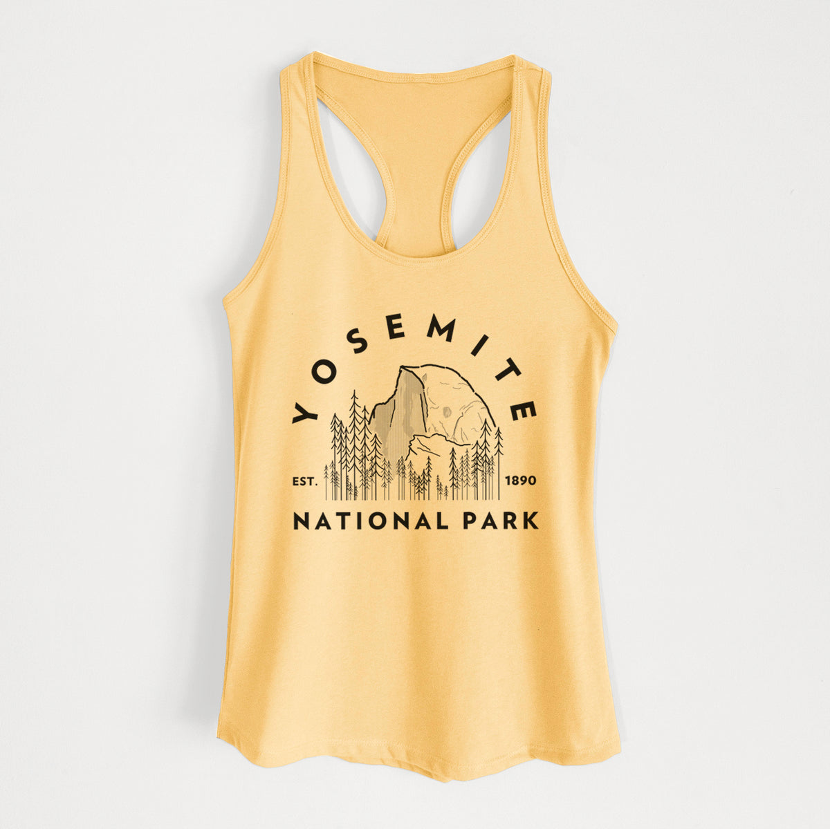 Banana cream women's racerback tank top laid flat, printed with a round badge of Half Dome and pine trees, with the words Yosemite National Park, Est. 1890.