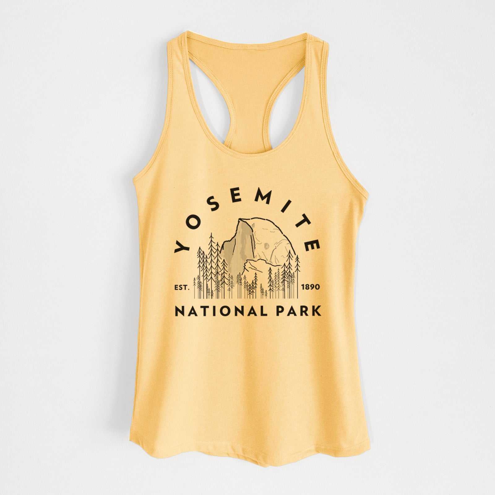 Banana cream women's racerback tank top laid flat, printed with a round badge of Half Dome and pine trees, with the words Yosemite National Park, Est. 1890.