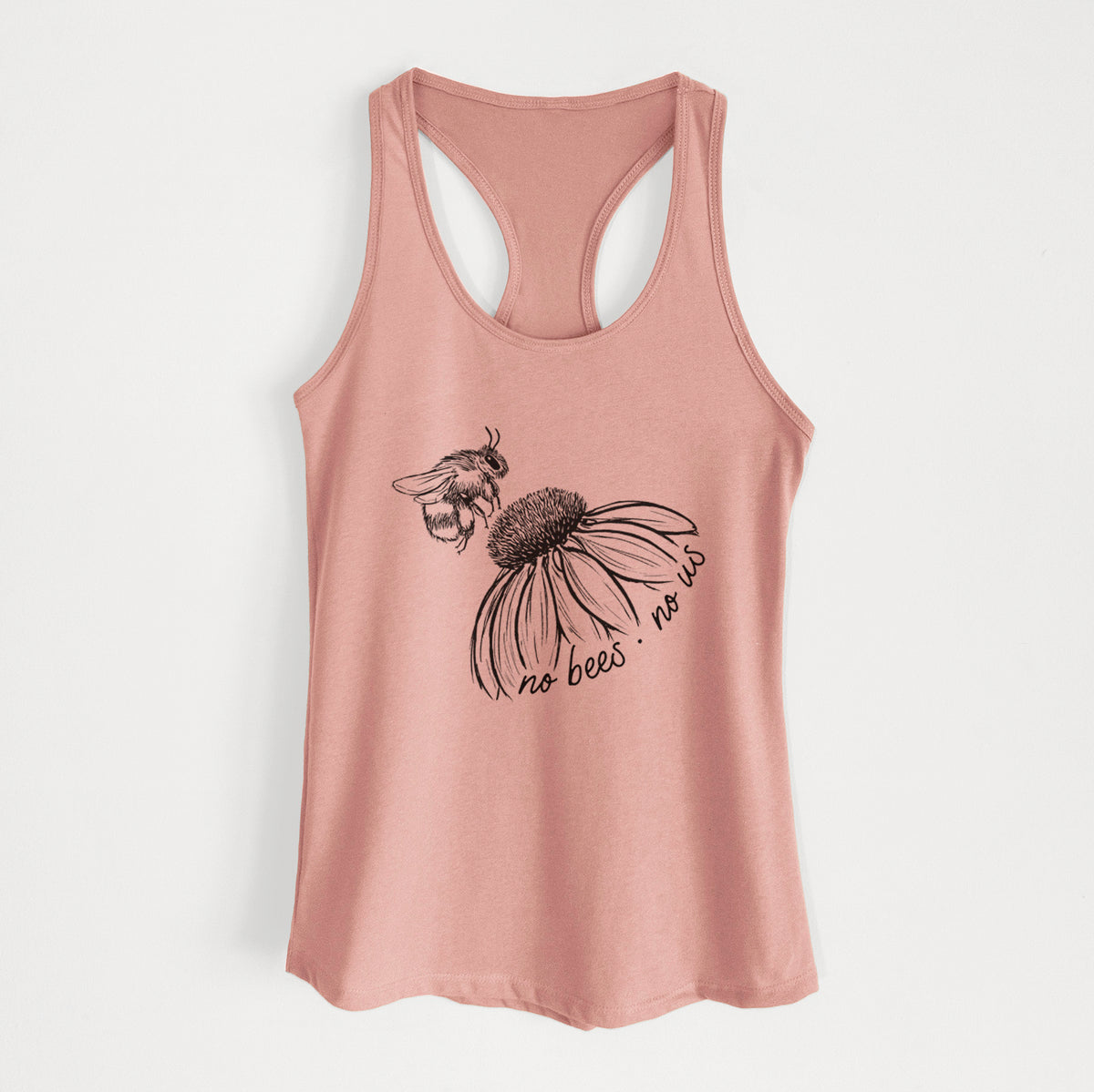 Desert pink women's racerback tank top laid flat, printed with a black ink illustration of a bee flying toward a coneflower, with the handwritten words no bees no us.