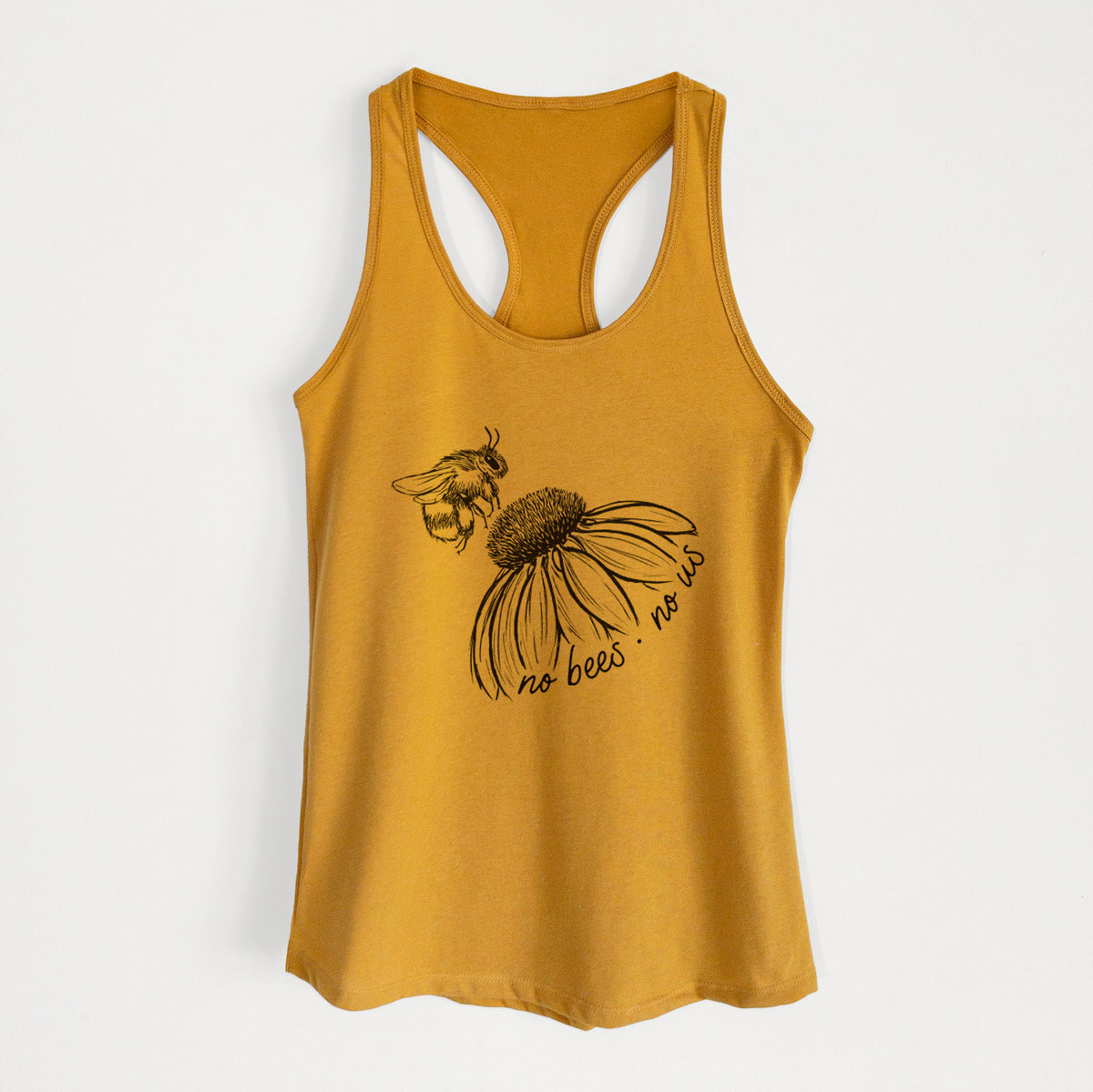 Gold women's racerback tank top laid flat, printed with a black ink illustration of a bee flying toward a coneflower, with the handwritten words no bees no us.