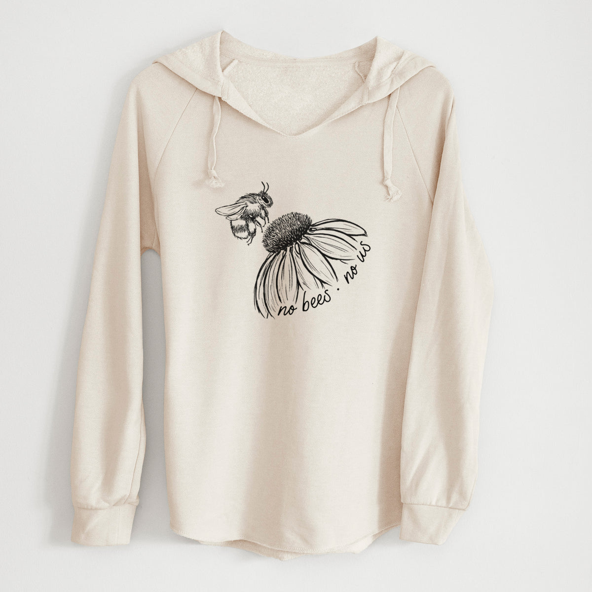 Bone cream women's Cali Wave hooded sweatshirt laid flat, printed with a black ink illustration of a bee flying toward a coneflower, with the handwritten words no bees no us.