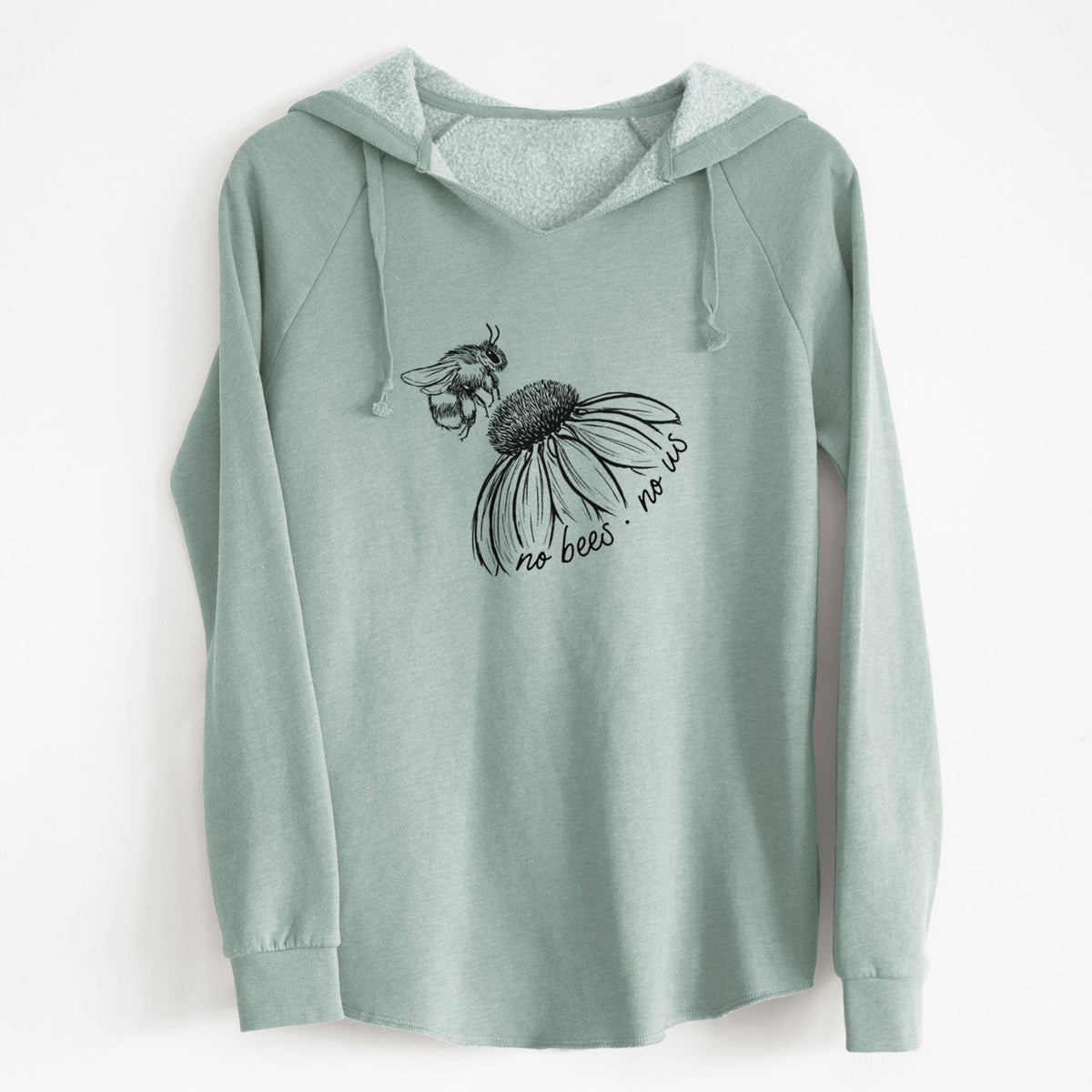 Sage green women's Cali Wave hooded sweatshirt laid flat, printed with a black ink illustration of a bee flying toward a coneflower, with the handwritten words no bees no us.