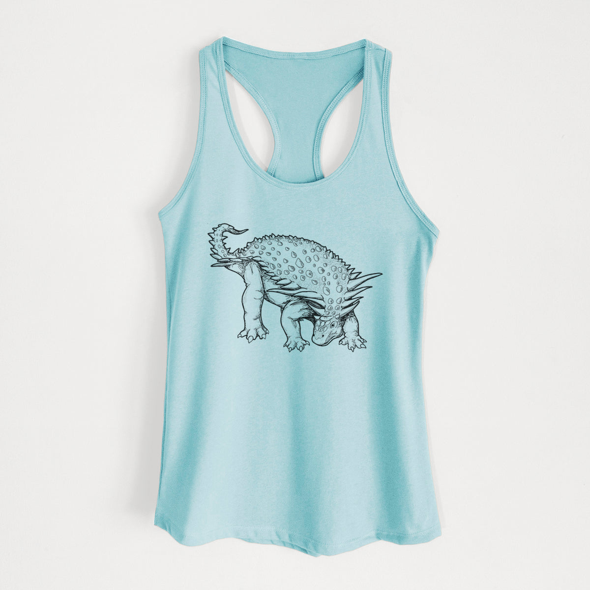 Cancun blue women's racerback tank top laid flat, printed with a black ink illustration of an armored Nodosaurus.