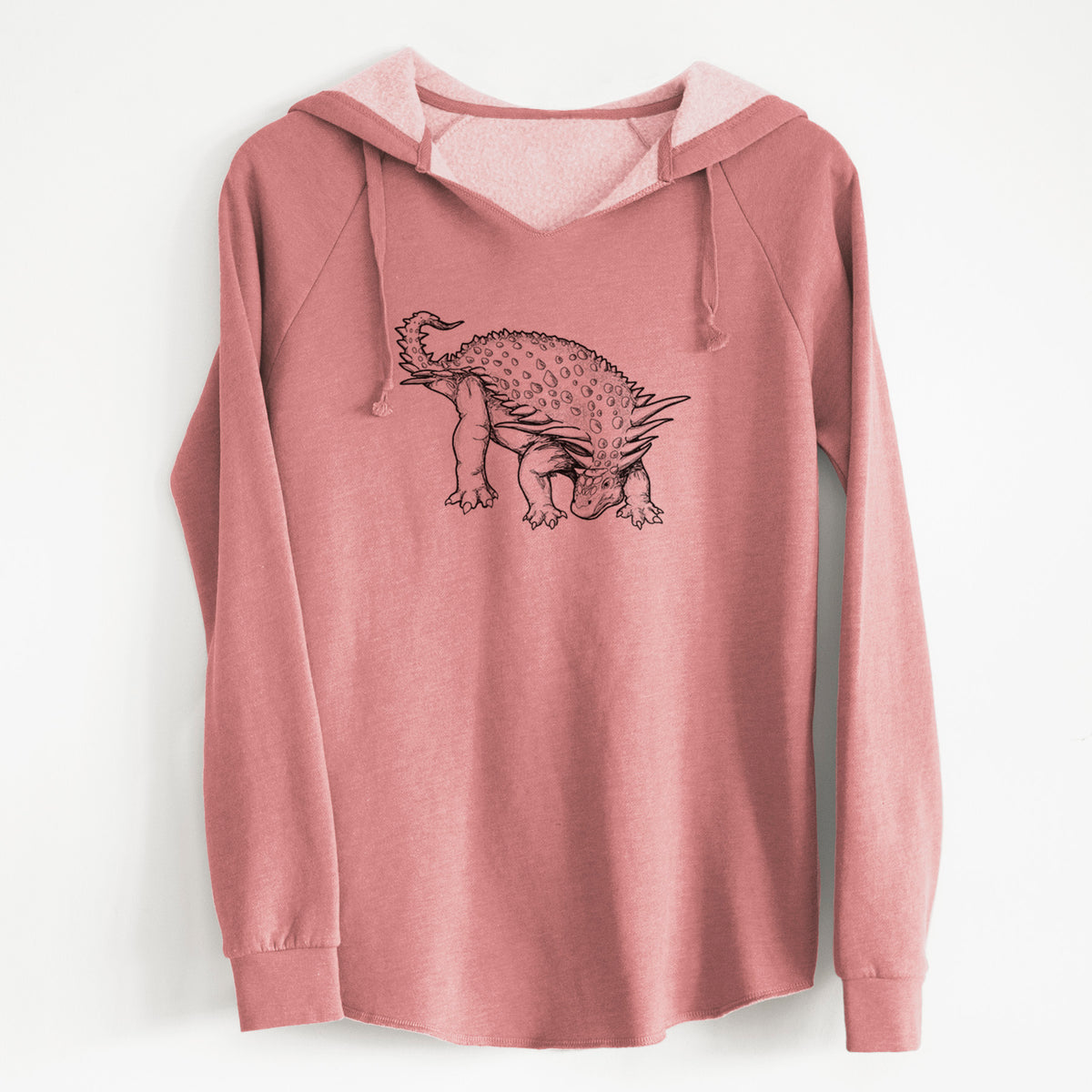 Dusty rose women's Cali Wave hooded sweatshirt laid flat, printed with a black ink illustration of an armored Nodosaurus.