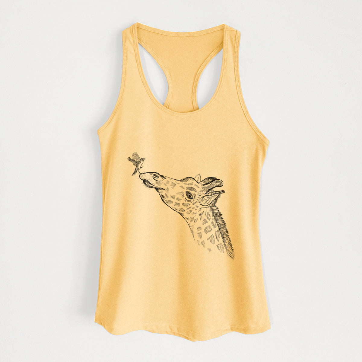 Banana cream women's racerback tank top laid flat, printed with a black ink illustration of a northern giraffe reaching its head up to nibble a flower.