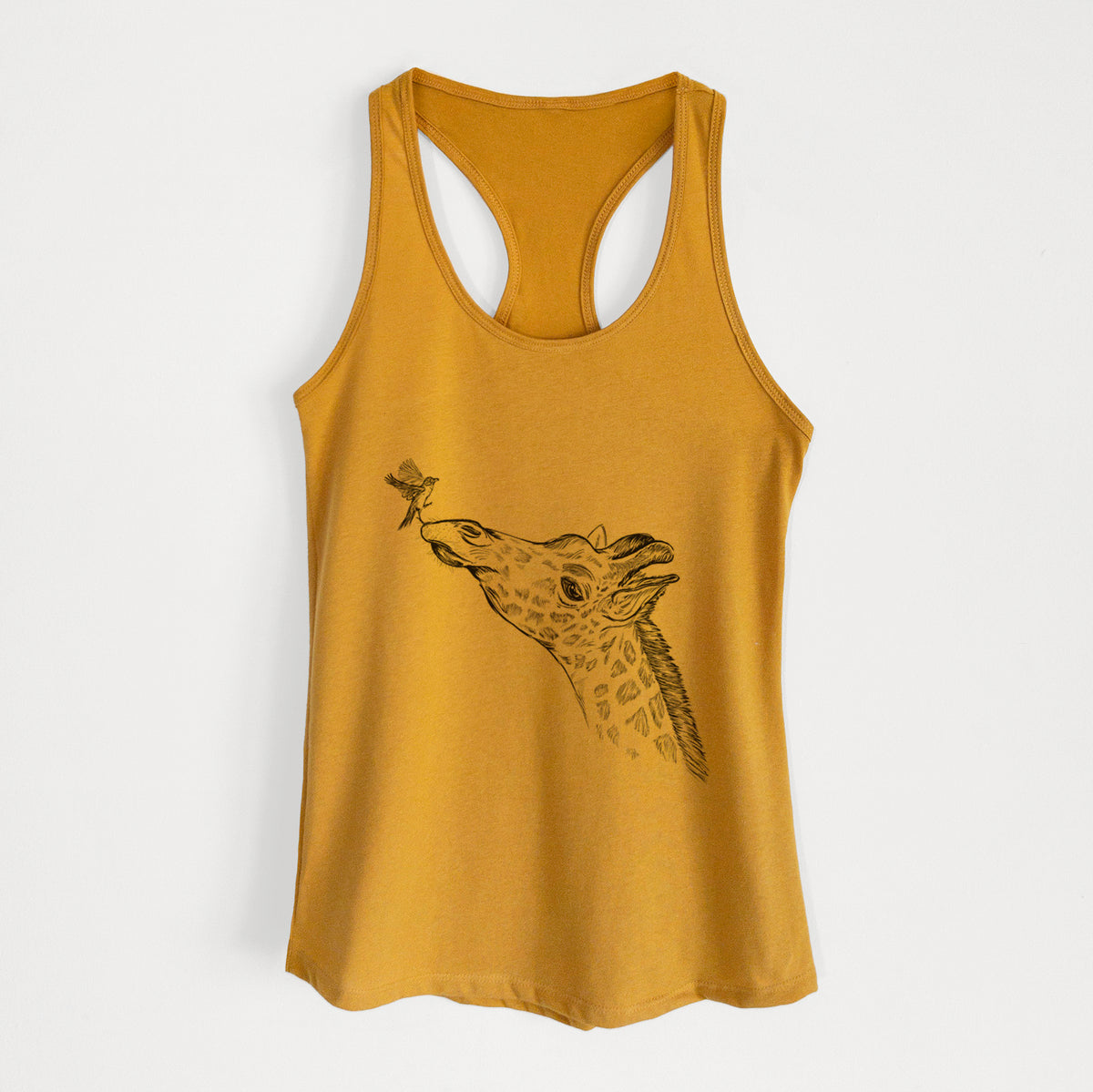 Gold women's racerback tank top laid flat, printed with a black ink illustration of a northern giraffe reaching its head up to nibble a flower.