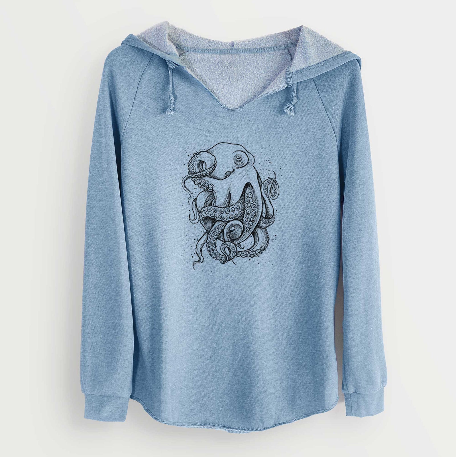Misty blue women's Cali Wave hooded sweatshirt laid flat, printed with a detailed black ink illustration of a common octopus with curling tentacles.