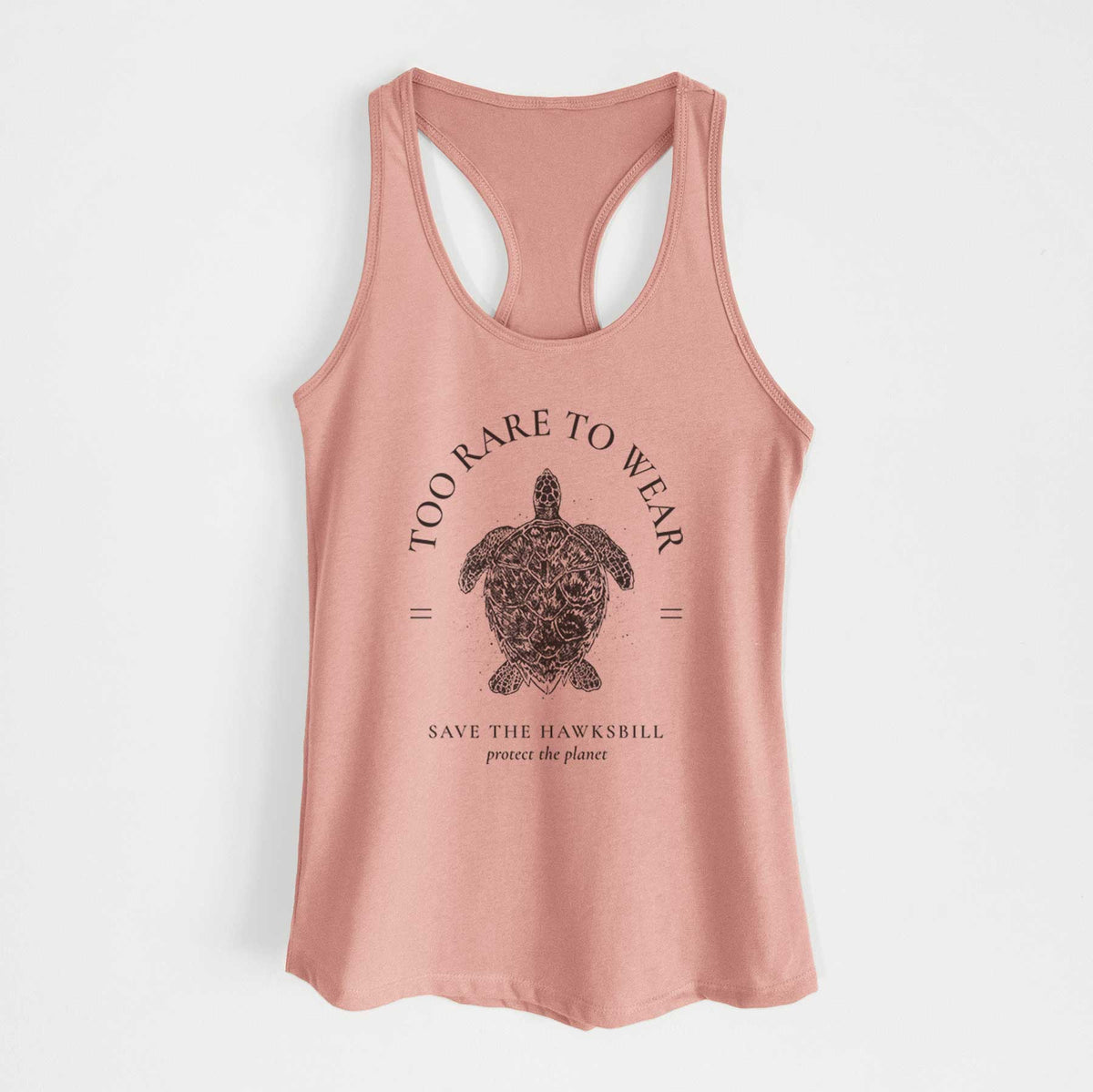 Desert pink women's racerback tank top laid flat, printed with a black ink hawksbill sea turtle framed by the words Too Rare to Wear, Save the Hawksbill.
