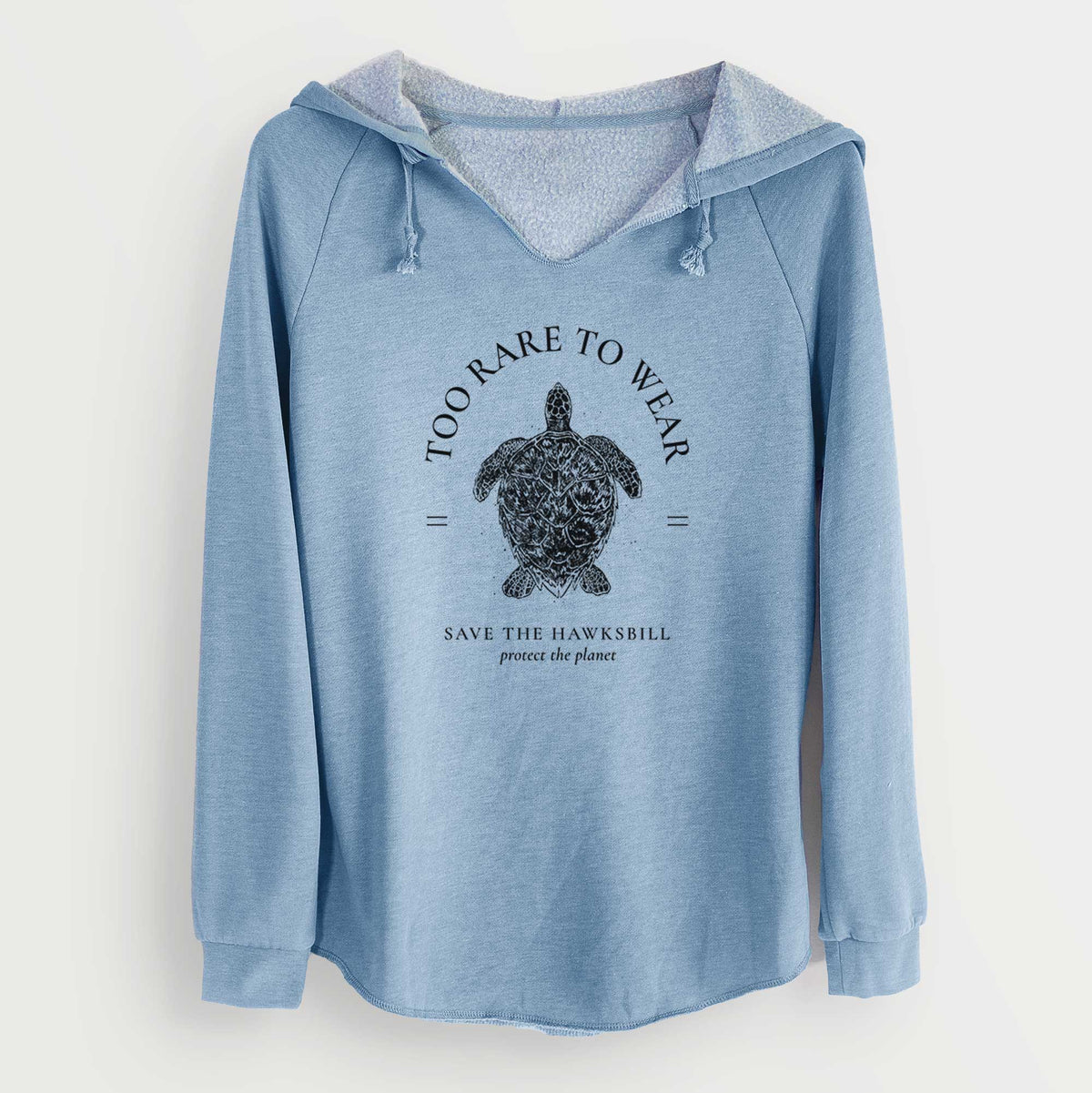 Misty blue women's Cali Wave hooded sweatshirt laid flat, printed with a black ink hawksbill sea turtle framed by the words Too Rare to Wear, Save the Hawksbill.