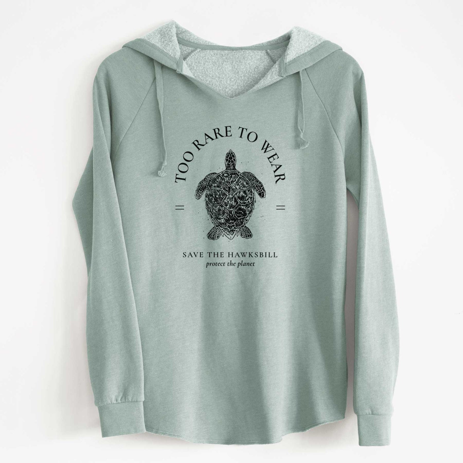 Sage green women's Cali Wave hooded sweatshirt laid flat, printed with a black ink hawksbill sea turtle framed by the words Too Rare to Wear, Save the Hawksbill.