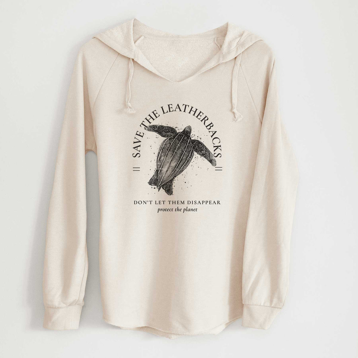 Bone cream women's Cali Wave hooded sweatshirt laid flat, printed with a black ink leatherback sea turtle framed by the words Save the Leatherbacks, Don't Let Them Disappear.