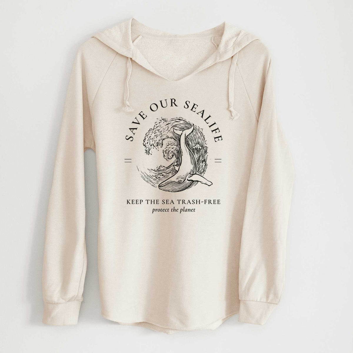 Bone cream women's Cali Wave hooded sweatshirt laid flat, printed with a black ink whale in an ocean wave framed by the words Save Our Sealife, Keep the Sea Trash-Free.