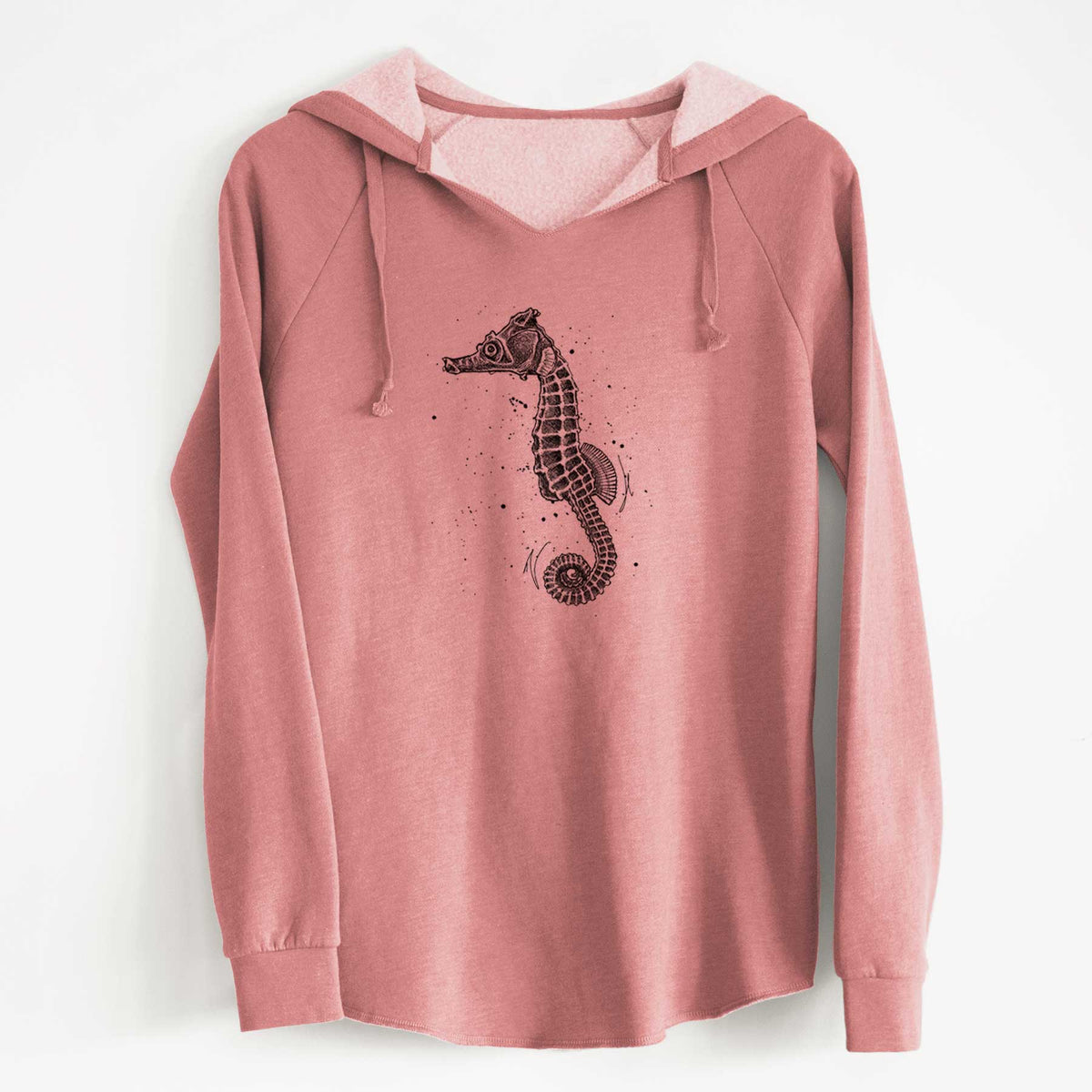 Dusty rose women's Cali Wave hooded sweatshirt laid flat, printed with a detailed black ink illustration of a Pacific seahorse with its tail curled.