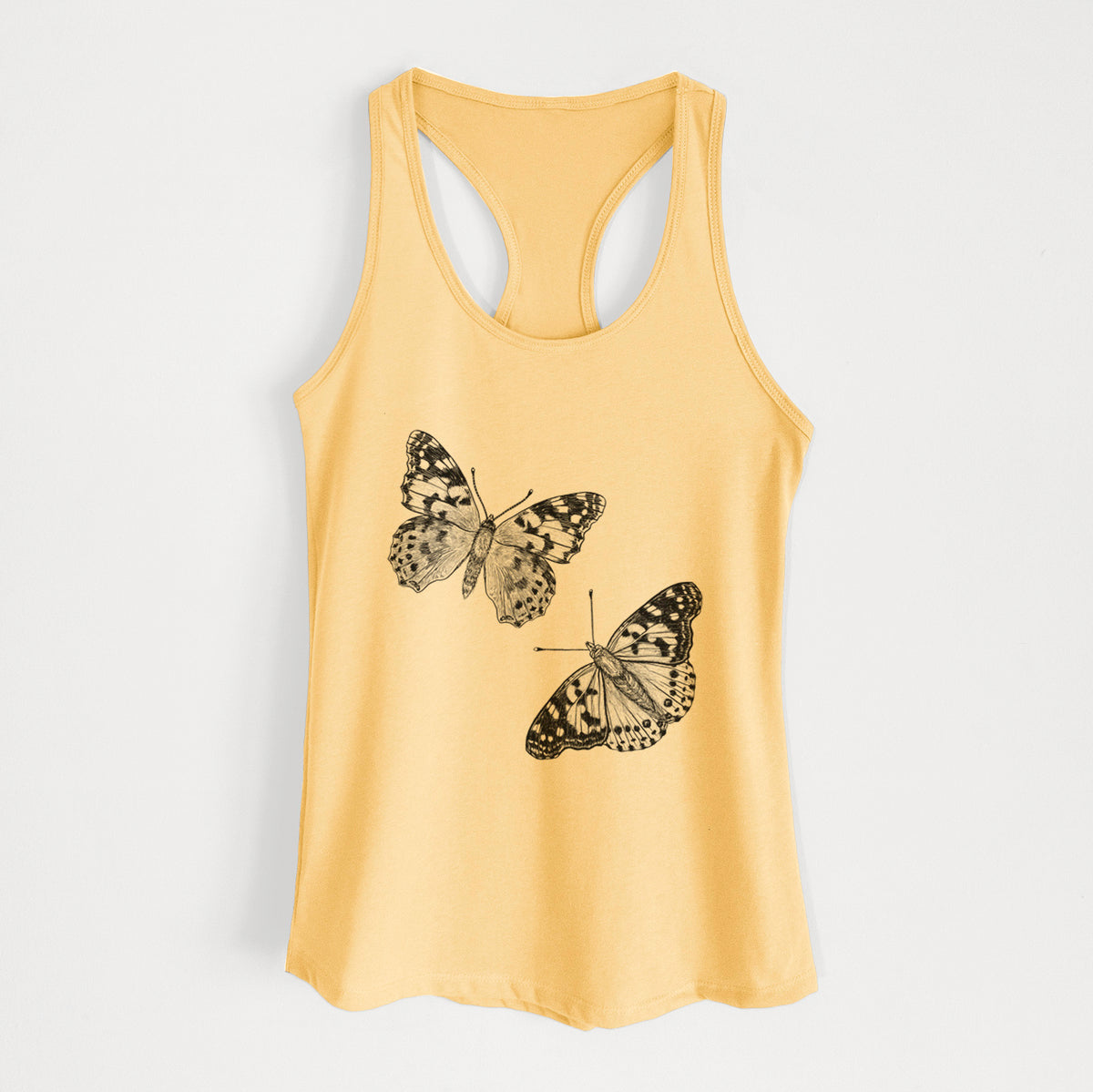 Banana cream women's racerback tank top laid flat, printed with a detailed black ink illustration of two painted lady butterflies.