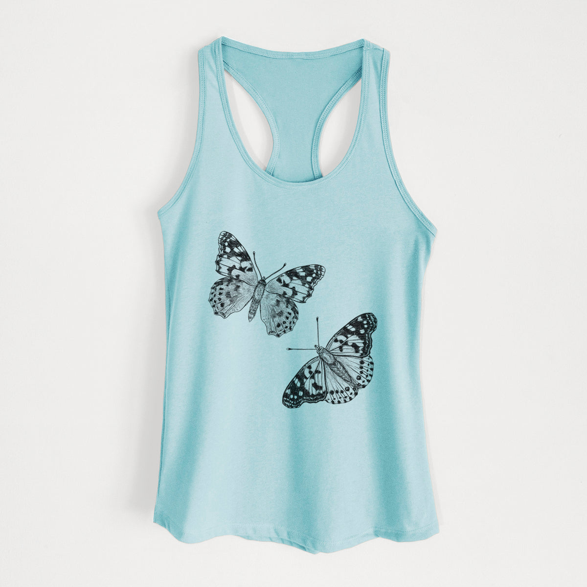 Cancun blue women's racerback tank top laid flat, printed with a detailed black ink illustration of two painted lady butterflies.