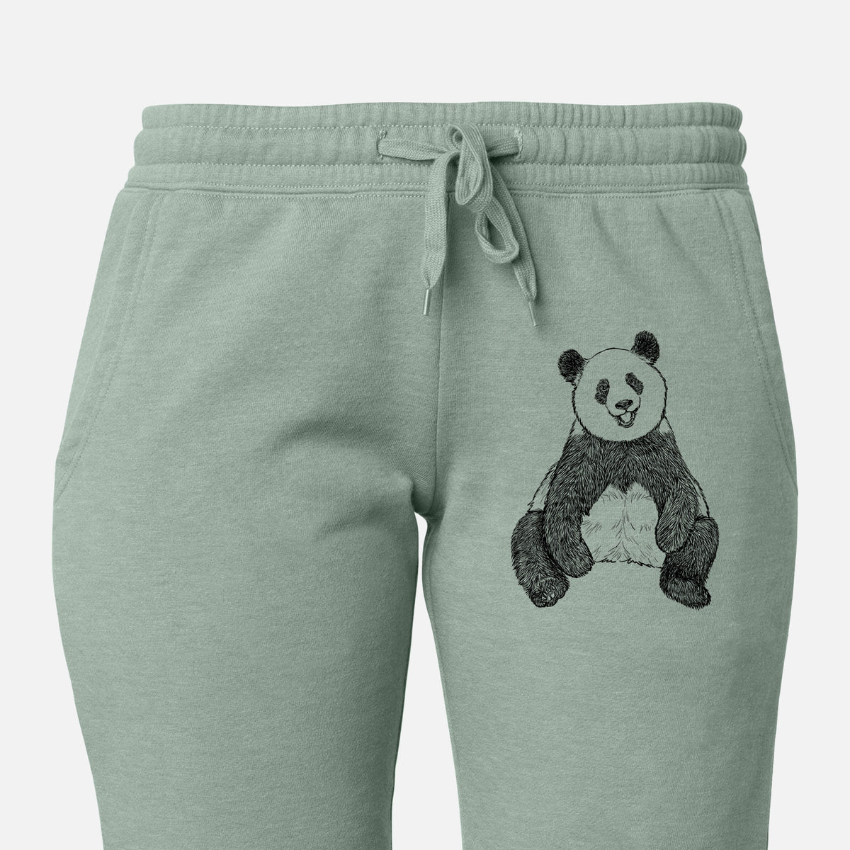 Front of sage green Cali Wave sweatpants, printed with a black ink illustration of a giant panda sitting and facing forward on the leg.
