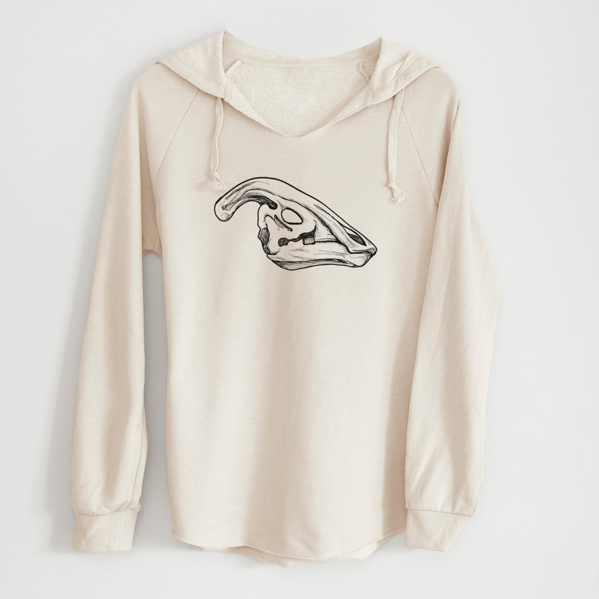 Bone cream women's Cali Wave hooded sweatshirt laid flat, printed with a detailed black ink illustration of a crested Parasaurolophus skull.