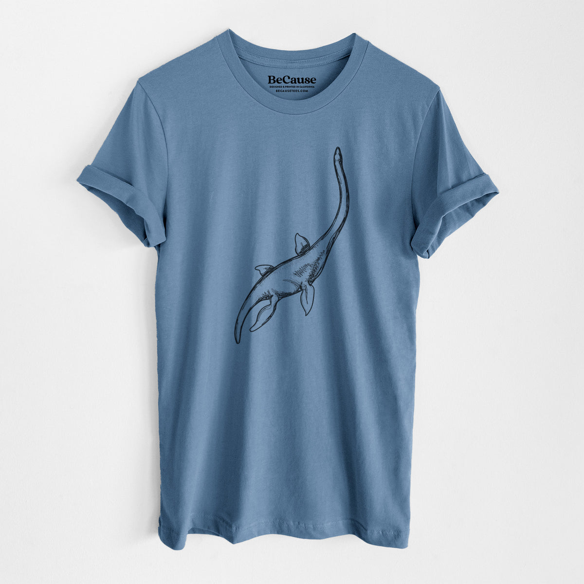 Steel blue lightweight cotton t-shirt laid flat, printed with a black ink illustration of a long-necked plesiosaur swimming.
