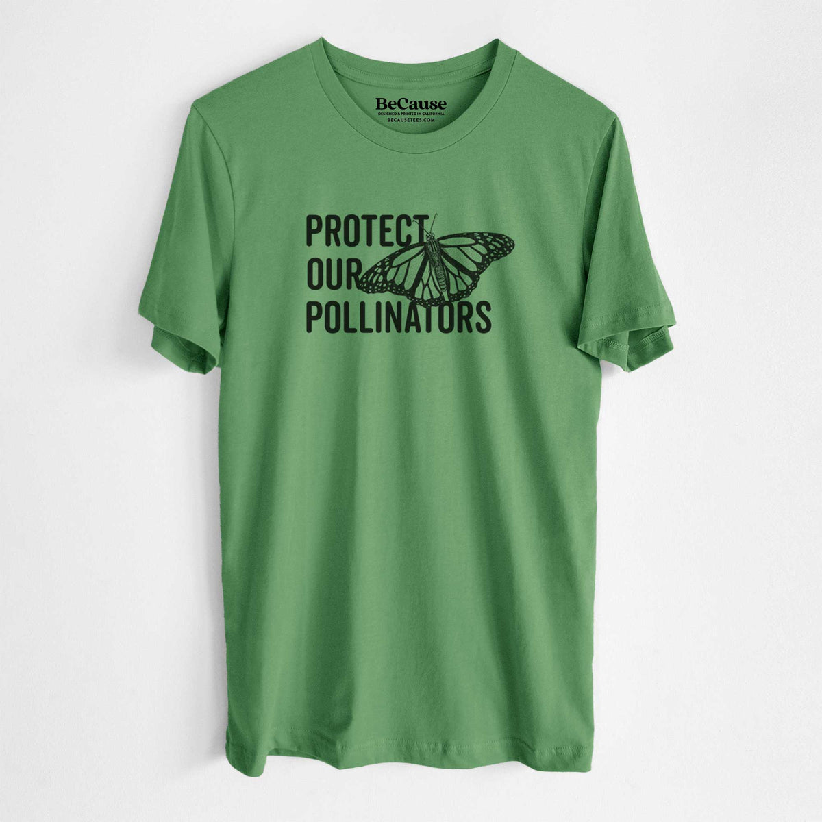 Leaf green lightweight cotton t-shirt laid flat, printed with bold black words reading Protect Our Pollinators beside a monarch butterfly.