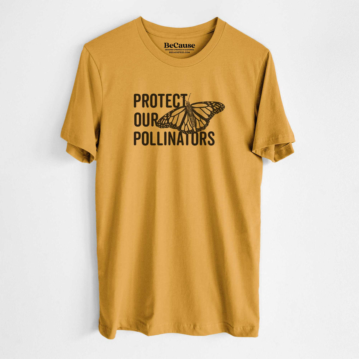 Mustard yellow lightweight cotton t-shirt laid flat, printed with bold black words reading Protect Our Pollinators beside a monarch butterfly.