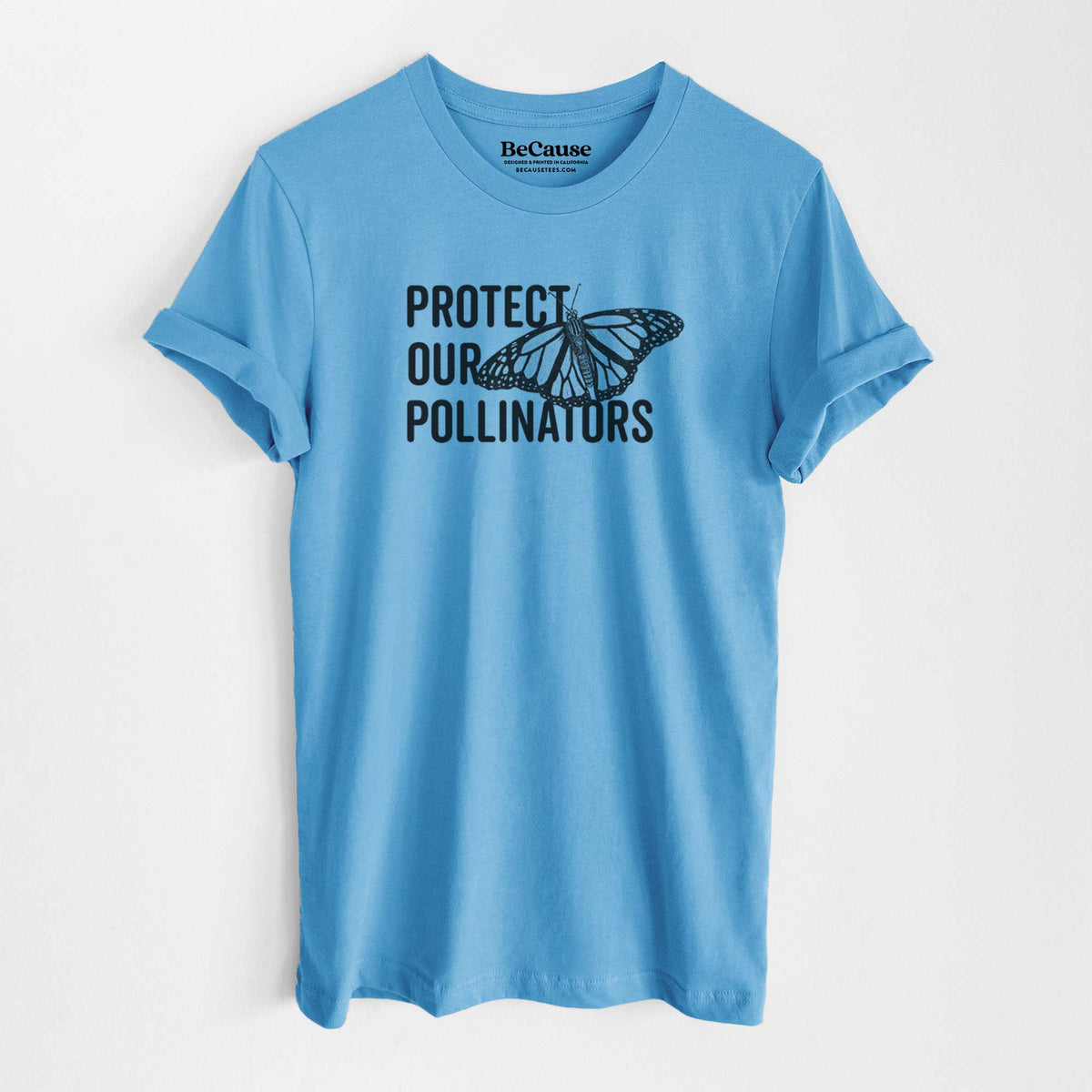 Ocean blue lightweight cotton t-shirt laid flat, printed with bold black words reading Protect Our Pollinators beside a monarch butterfly.