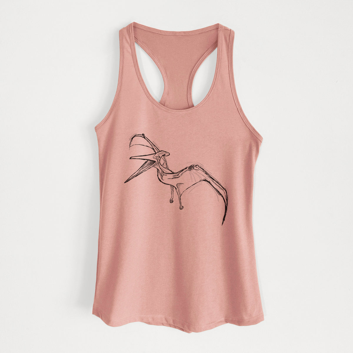Desert pink women's racerback tank top laid flat, printed with a black ink illustration of a Pteranodon in flight.