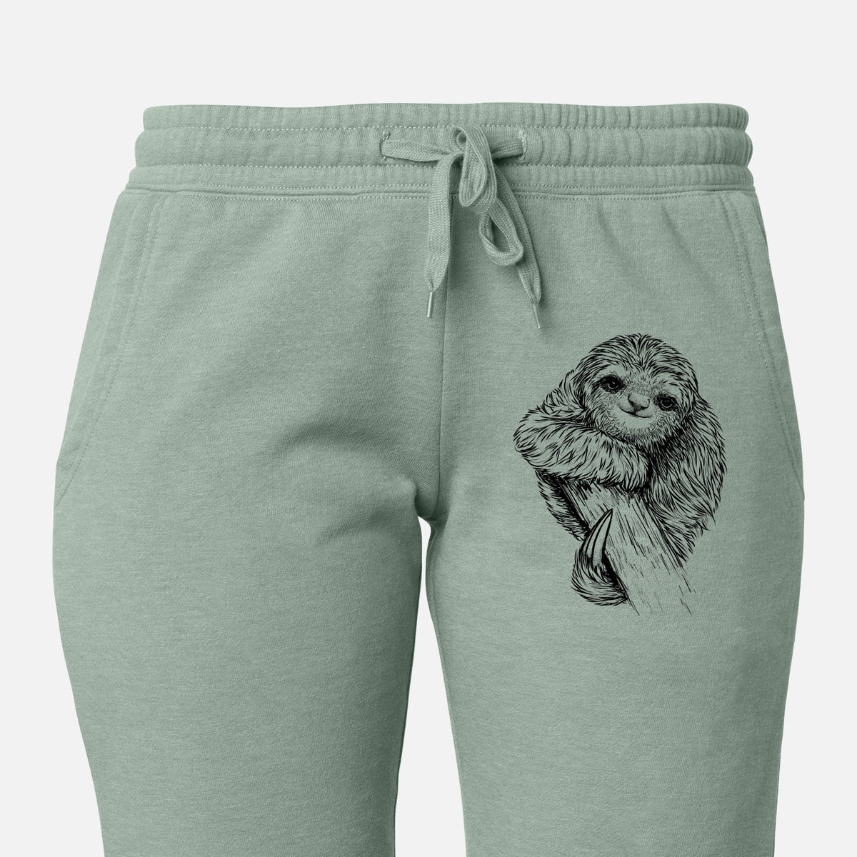 Front of sage green Cali Wave sweatpants, printed with a detailed black ink illustration of a smiling pygmy three-toed sloth hanging from a branch on the leg.