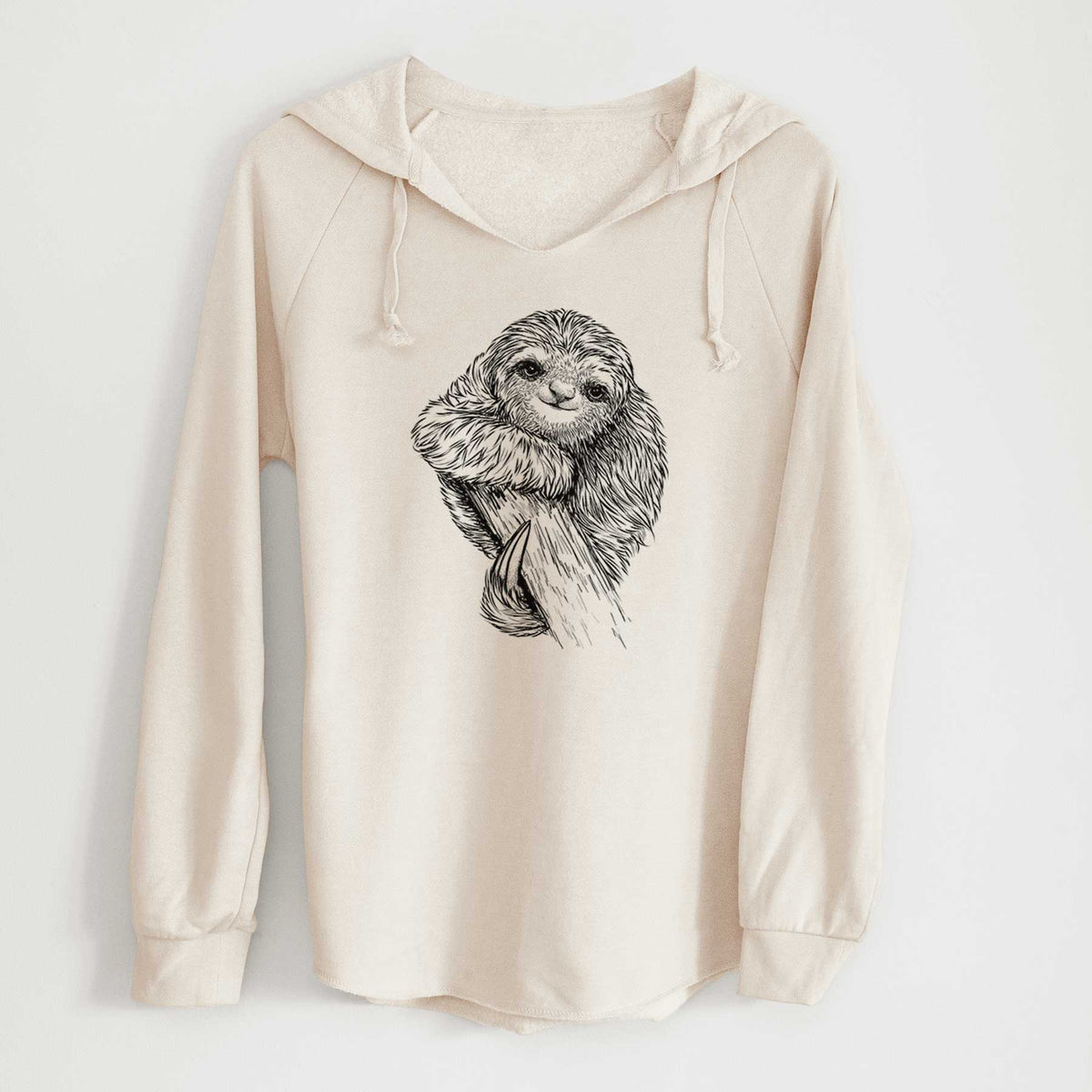 Bone cream women's Cali Wave hooded sweatshirt laid flat, printed with a detailed black ink illustration of a smiling pygmy three-toed sloth hanging from a branch.